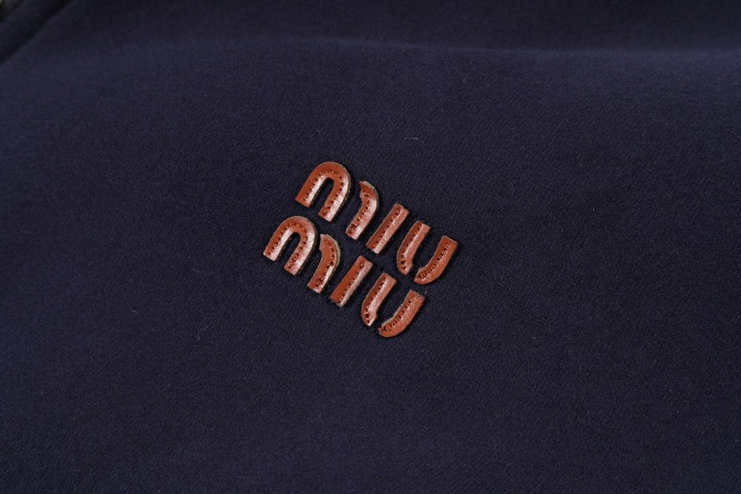 ג׳קט מיו מיו