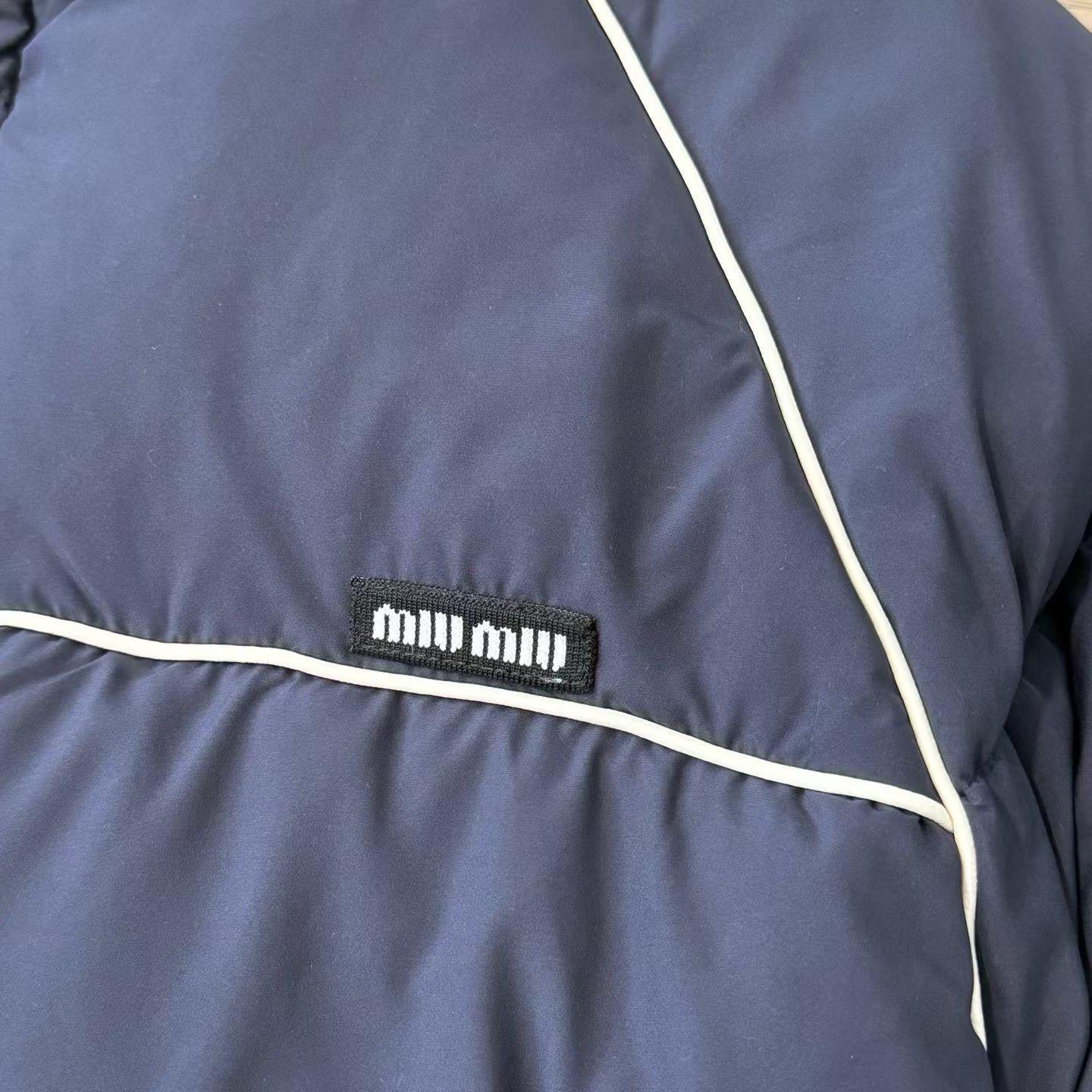 מעיל מיו מיו